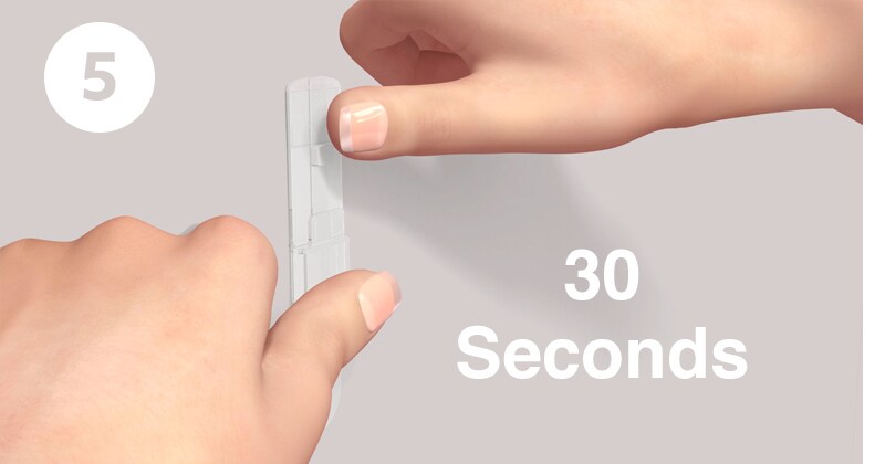 コマンドフックの取り付け手順5：ベース板を30秒間しっかりと押し付ける

